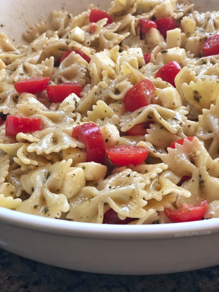 Quick and Easy Cold Italian Pasta Salad Recipe -- Made with simple ingredients! It's perfect for parties, family gatherings, potlucks and BBQs! A fabulous summer side dish. Just like a caprese salad! | Instrupix.com