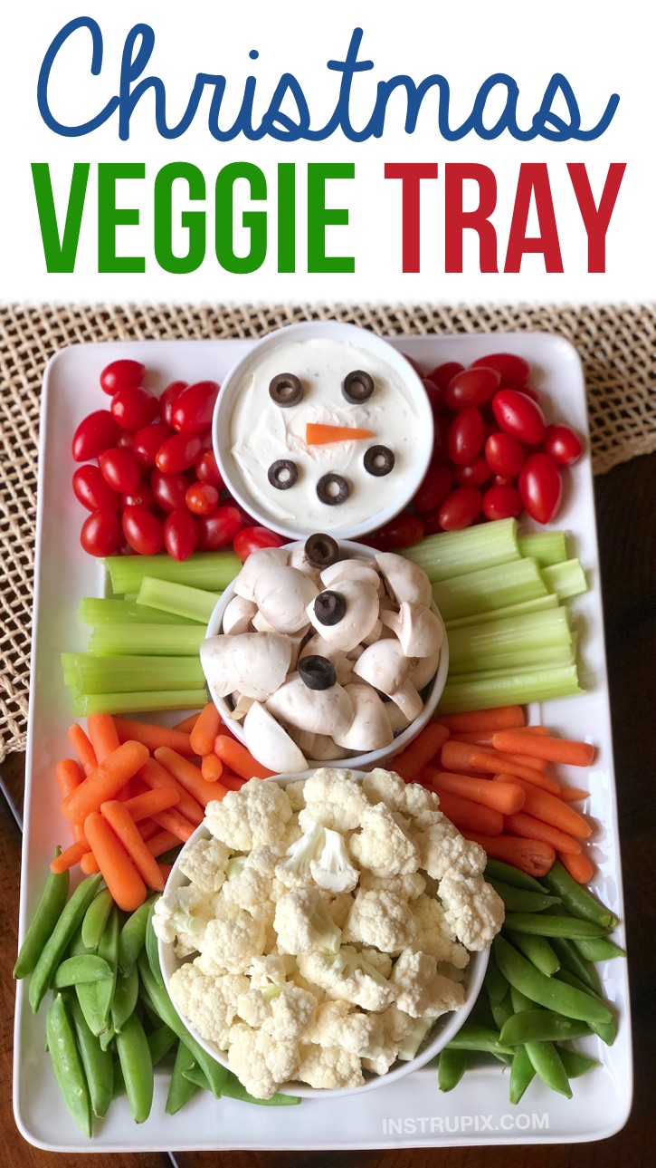 Christmas veggie tray idea for holiday parties! Check out this super fun and cute snowman vegetable tray. It's so simple to make and the kids and adults will love this healthy finger food appetizer idea! Perfect for a crowd or large family gathering. Make ahead, no bake, easy, healthy and super fun! #christmas #holidays #appetizers #veggietray #instrupix