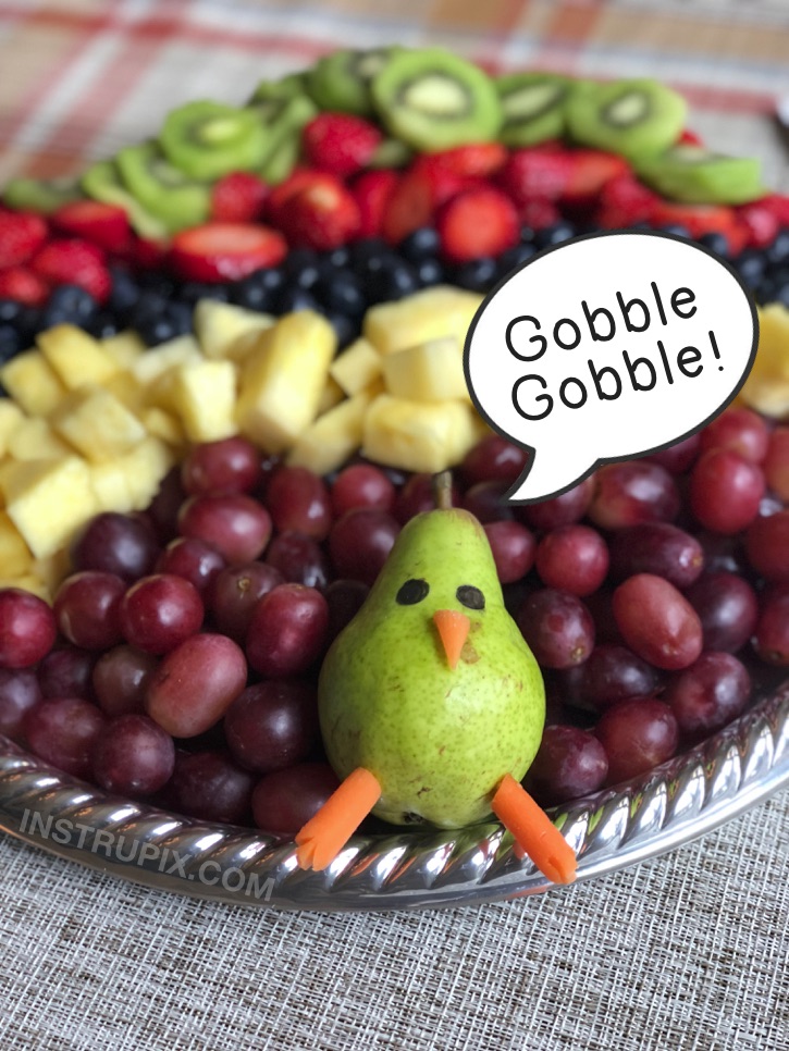 Turkey Fruit Tray for Thanksgiving. Such a cute and fun idea for a table display! | Instrupix