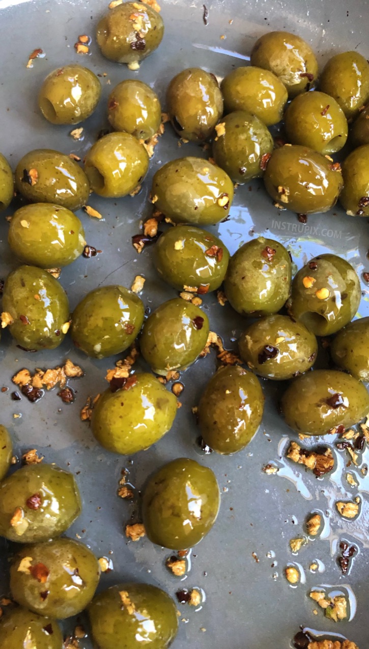 Blistered Green Olives - YUM!! This easy low carb snack idea is perfect for on the go! They are also the most amazing little keto party snacks to accompany a cheese board. | Instrupix #keto #lowcarb #greenolives #instrupix 