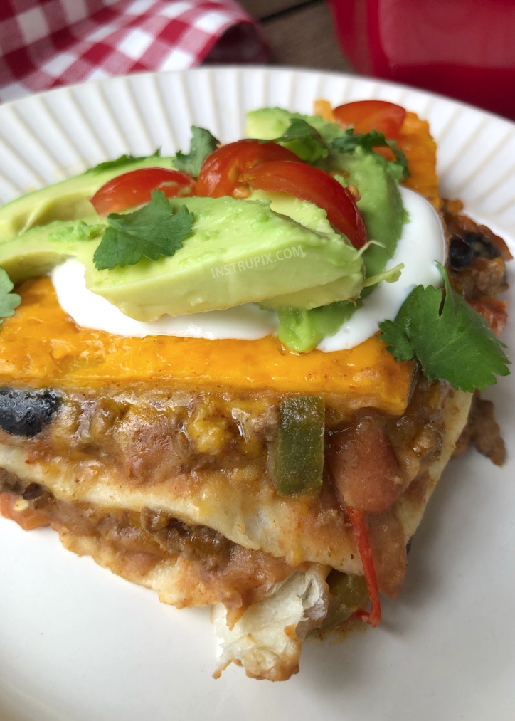 Cheesy Taco Lasagna Recipe - This quick and easy dinner idea for the family is always a hit! The kids beg for it. It's basically a mexican casserole stuffed with beef, beans and lots of cheese! #instrupix #dinnerideas #easydinner #mexicanfood #tacolasagna