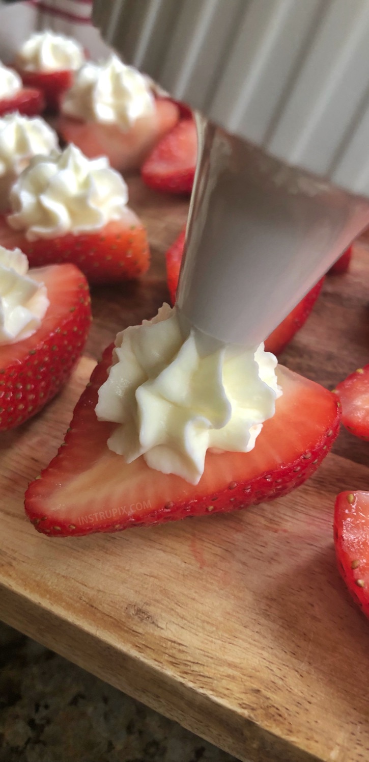 Deviled Strawberries Recipe (made with a sweet cream cheese filling) - The BEST finger food, sweet snack and party idea for a crowd! This quick, easy and fun appetizer idea is also perfect for Valentine's Day! Kids and adults love them. #instrupix #partyfood #strawberries #cheesecake #creamcheese #valentinesday #dessert #sweettooth 