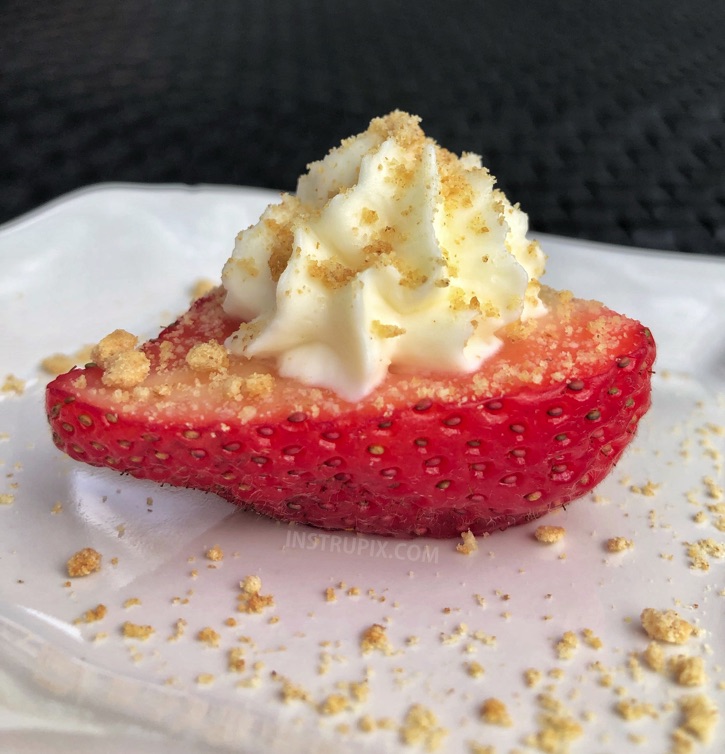 Deviled Strawberries (made with a sweet cream cheese filling) - The BEST finger food, sweet snack and party idea for a crowd! This quick, easy and fun appetizer idea is also perfect for Valentine's Day! Kids and adults love them. #instrupix #partyfood #strawberries #cheesecake #creamcheese #valentinesday #dessert #sweettooth 