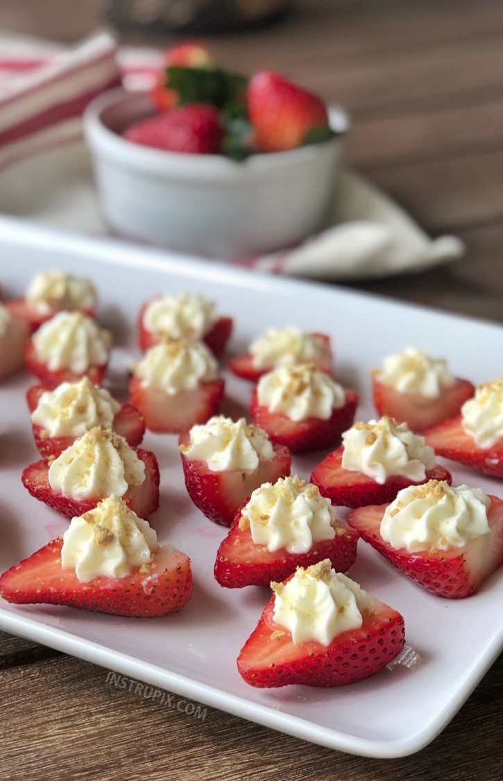 Deviled Strawberries (made with a sweet cream cheese filling) - The BEST finger food, sweet snack and party idea for a crowd! This quick, easy and fun appetizer idea is also perfect for Valentine's Day! Kids and adults love them. #instrupix #partyfood #strawberries #cheesecake #creamcheese #valentinesday #dessert #sweettooth 