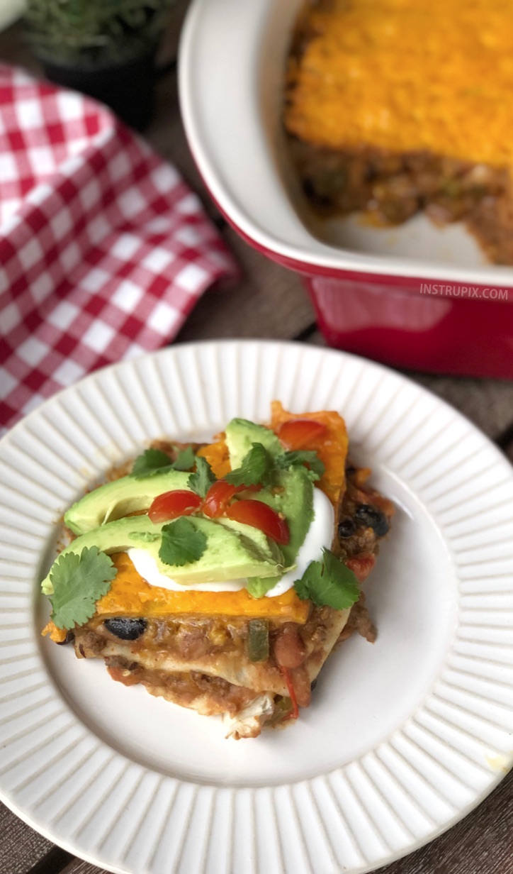 Cheesy Taco Lasagna Recipe - This quick and easy dinner idea for the family is always a hit! The kids beg for it. It's basically a mexican casserole stuffed with beef, beans and lots of cheese! #instrupix #dinnerideas #easydinner #mexicanfood #tacolasagna