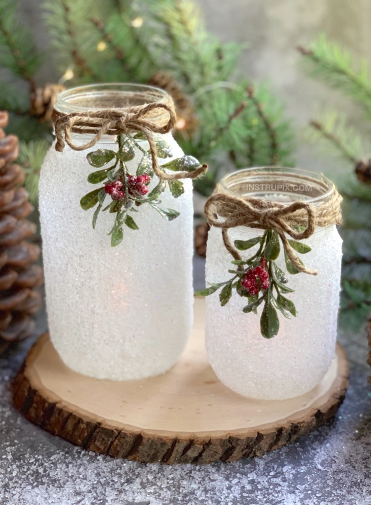 If you are looking for easy Christmas projects to make, these DIY Snowy Mason Jars are a fabulous gift idea! This easy holiday craft is perfect for adults but also easy enough for kids. It's quick, simple, and cheap yet a stunning home decor idea for Christmas! I like to use these DIY mason jar tea light holders as a centerpiece on my dining room table. #instrupix #christmas #masonjars 