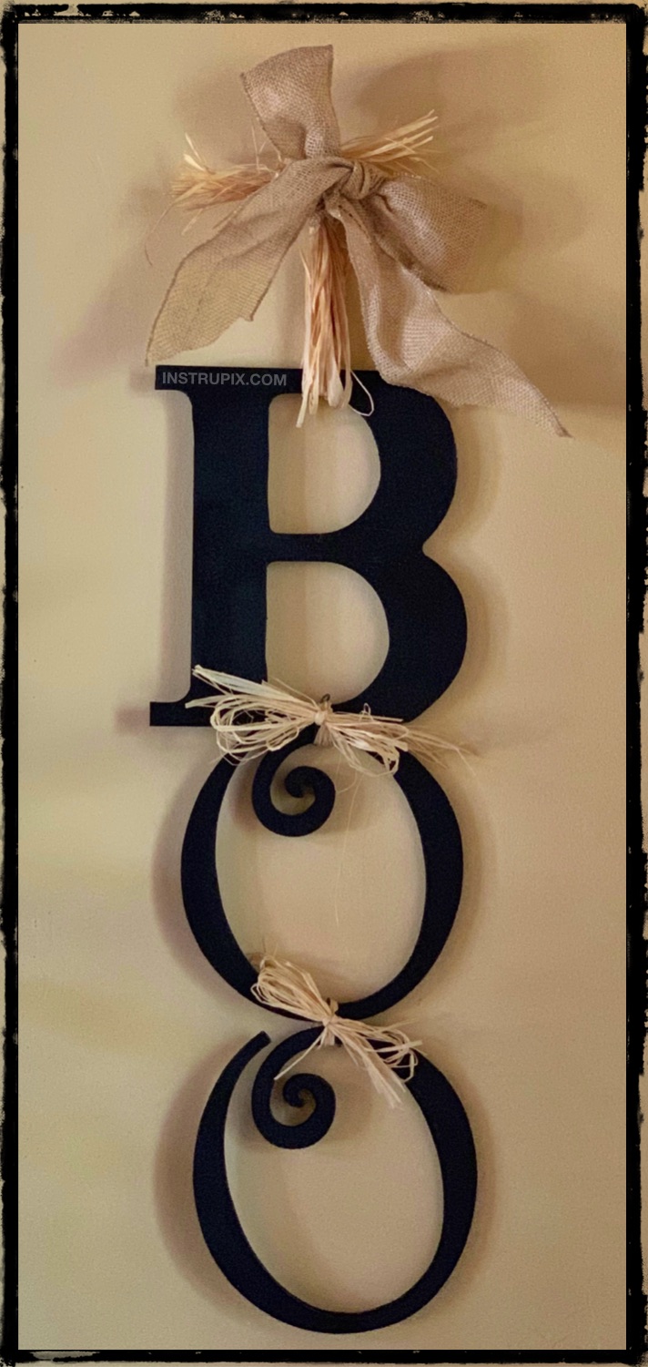 Looking for easy DIY Halloween decoration ideas? This easy Boo sign is super fun to hang on your front door or by your entryway. It's great for inside or outside, hang it wherever you want! This homemade Halloween decor is simple, cheap and fun to make! #halloween #instrupix 