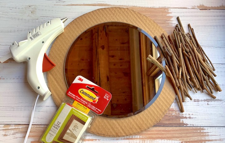 Cheap Easy DIY Stick Framed Mirror That looks Expensive