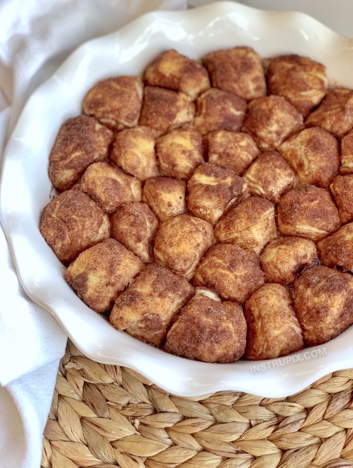 Easy Homemade Oven Baked Doughnut Holes made with Pillsbury biscuits, cinnamon, sugar and butter.