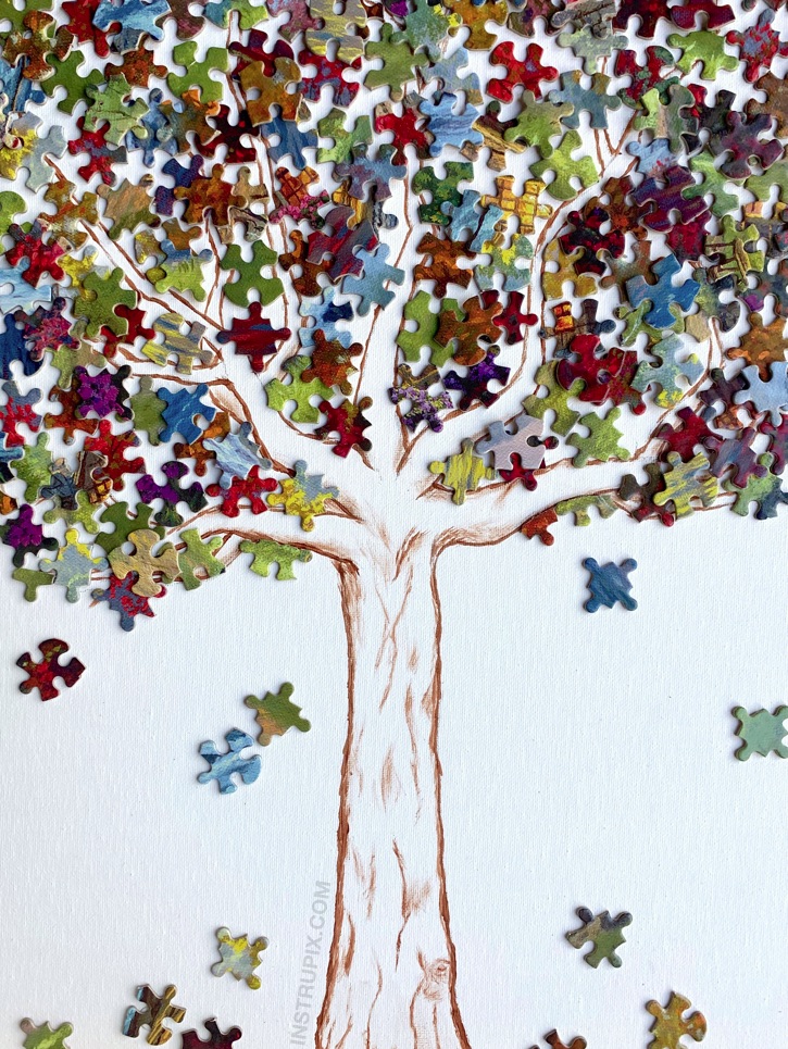 Fun & Creative Puzzle Piece Craft Ideas -- This puzzle piece tree is awesome DIY wall decor for teenagers and adults to make! It's a fun and simple recycling project and stress reliever. #instrupix #craftideas