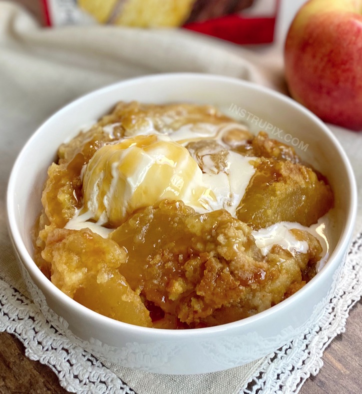 Super easy apple dessert recipe made with boxed cake mix! Just 4 ingredients. Caramel Apple Cobbler Dump Cake -- The BEST fall dessert! 