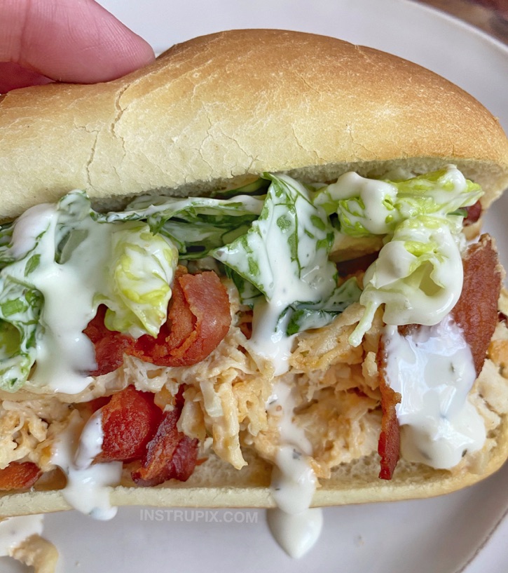 Easy Crockpot Crack Chicken Sandwiches (the best slow cooker shredded chicken made with cream cheese, cheddar and ranch seasoning!)