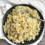 Keto Side Dish Ideas (Garlic Parmesan Cauliflower Rice) Quick and easy to make with frozen cauliflower rice! The best side dish for any low carb meal.