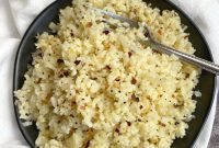 Keto Side Dish Ideas (Garlic Parmesan Cauliflower Rice) Quick and easy to make with frozen cauliflower rice! The best side dish for any low carb meal.