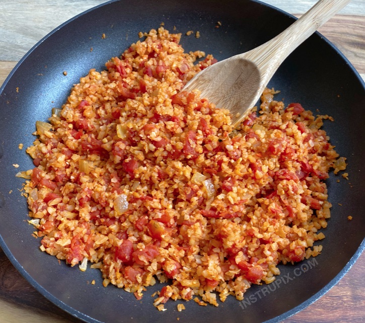 Spanish Cauliflower Rice (easy, low Carb and made with frozen cauliflower rice!) A simple and healthy side dish recipe that's packed full of fiber.