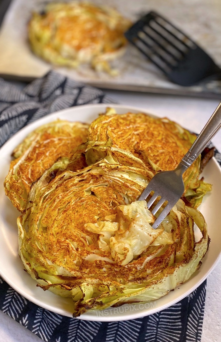 Oven Baked Roasted Cabbage Steaks (Healthy, Low Carb, Keto, Vegan & Super Easy To Make) My favorite veggie side dish for dinner! These cabbage steaks are made with just a few simple ingredients including olive oil, garlic powder and paprika. A family favorite! Serve them alone or with chicken, steak or seafood.