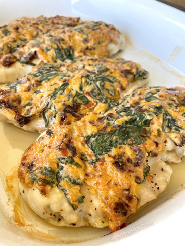 Looking for easy oven baked chicken breast ideas for your picky family? They are going to love this cream cheese recipe! It's naturally healthy and low carb, but absolutely delicious. Quick to make for busy weeknight meals. Loaded with healthy spinach! 