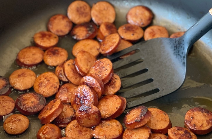 Cajun sausage dinner idea! This low carb skillet is filling with cabbage and delicious seasoning. 