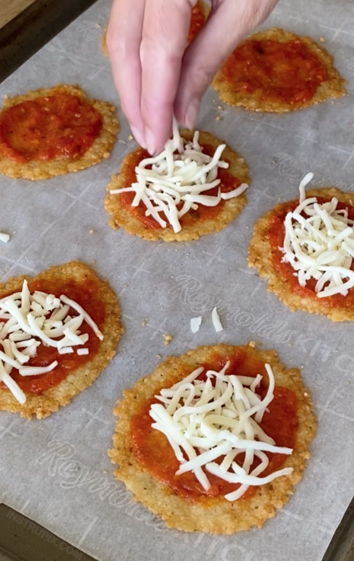 Mini Parmesan Crust Pizzas | Super crispy and delicious! These little pizzas are also naturally low carb and keto friendly. Super fast to make in your oven as a snack or last minute meal. 