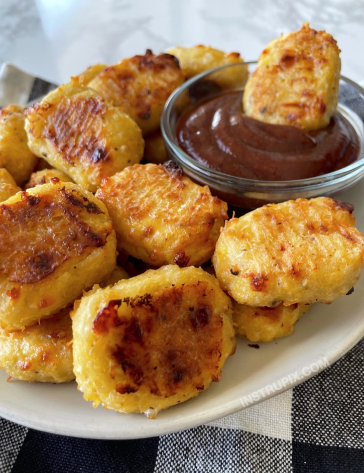 Keto chicken nuggets made with canned chicken! A super quick and easy oven baked chicken nugget recipe that is naturally low carb and healthy. 
