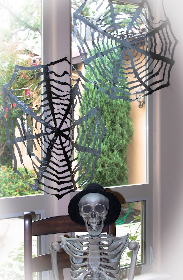 DIY Trash Bag Spiderwebs Cheap Easy Halloween Decor