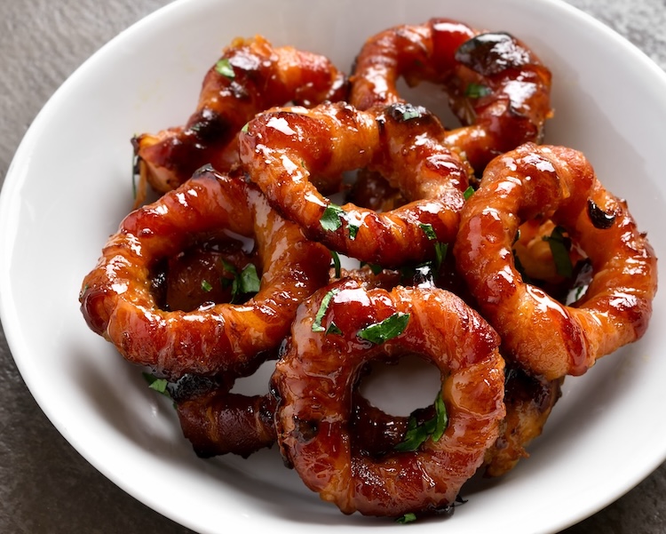 How to make the best bacon wrapped onion rings in your air fryer or oven.