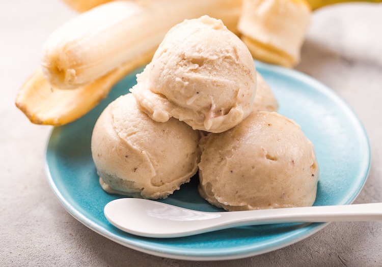 This healthy summer time frozen treat is made with just frozen bananas in a blender or food processor. You can also flavor banana ice cream with peanut butter, cocoa, strawberries, or anything else you'd like for a healthy and yummy treat your kids will love.