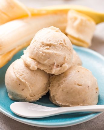 Frozen banana ice cream is a healthy treat made with just frozen fruit. No added sugar or other ingredients, making for a clean eating dessert your kids will love.