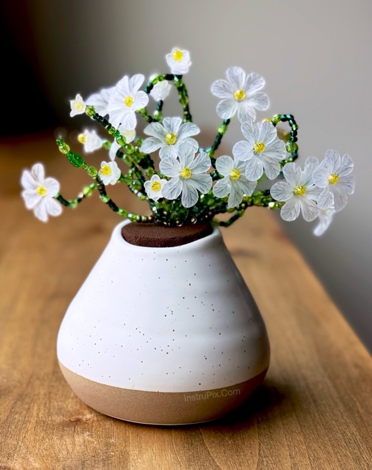 Beaded wire flowers in a white ceramic pot. A DIY beautiful craft project to make at home for fun and for gifts.