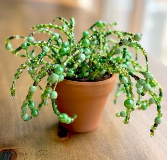 DIY Bead Plant Craft that looks like a succulent. An easy and beautiful project for adults to make at home.