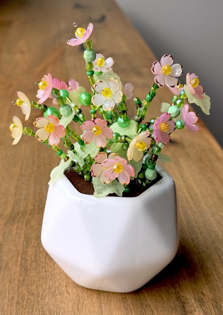 How to make a DIY flower pot with a variety of beads. A beautiful and creative craft to make for adults. The end result makes for lovely home decor or a creative homemade gift.